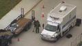 Video: [News Clip: Aerial Insight - Dallas Police Bomb Squad Tackles Suspici…