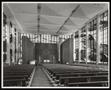Photograph: [Three rows of pews inside a church, 1]