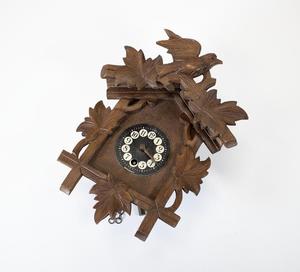 Primary view of object titled '[Carved wooden clock]'.