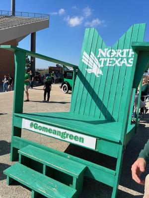Primary view of object titled '[The Giant Green Chair at the DATCU Stadium]'.