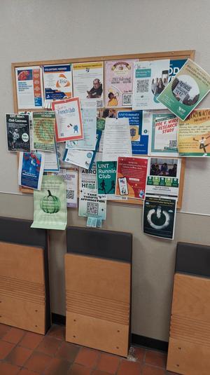 Primary view of object titled '[A Bulletin Board Inside Wooten Hall]'.