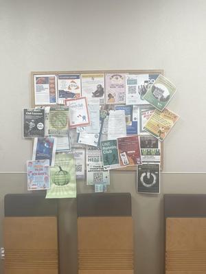 Primary view of object titled '[Bulletin board at Wooten Hall with Posters for Various Student Activities]'.