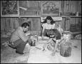 Photograph: [Campus Artists Painting, 1942]