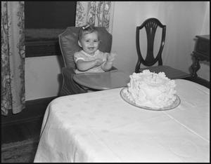 Primary view of object titled '[A Little Girl and her Birthday Cake, 1942]'.