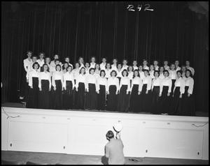 Primary view of object titled '[The 1942 All Female Choir Posing on Stage]'.