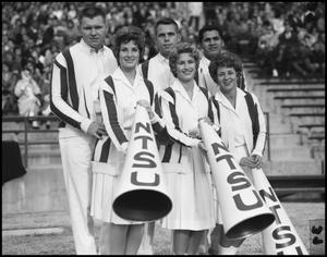Primary view of object titled '[Cheerleaders during an Event, November 1961]'.