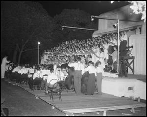 Primary view of object titled '[Campus Choir Performing Outside at Night]'.