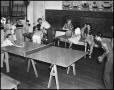 Photograph: [People recreate in an activity room]