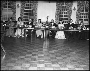 Primary view of object titled '[Fine Arts Committee during an Awards Banquet, 1942]'.
