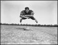 Thumbnail image of item number 1 in: '[Football Player Noe Flores No. 69 Diving for the Football, September 1960]'.