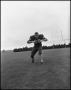 Photograph: [North Texas State University Jersey No. 69 Football Player Game Face…
