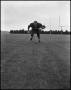 Photograph: [North Texas State University Jersey No. 25 Football Player Running L…