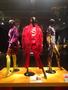Primary view of [Multiple outfits and ensembles on display for fashion exhibit]