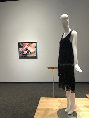 Primary view of object titled '[A 1920s beaded dress in front of a Nancy Lamb painting]'.