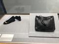Photograph: [Shoes by Chanel and a Bottega Veneta woven leather handbag]