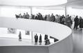 Primary view of [A crowded balcony at the Guggenheim]