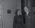 Photograph: [A man and woman in front of a museum painting, 2]
