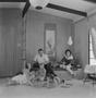Photograph: [The Citron family sitting in a living room, 1]