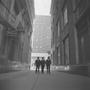 Primary view of [Three suited men on a dark street, 5]