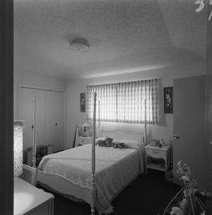 Primary view of object titled '[A bedroom with pale furniture, 2]'.