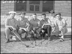 Primary view of object titled '[North Texas State Golf Team Kneeling]'.