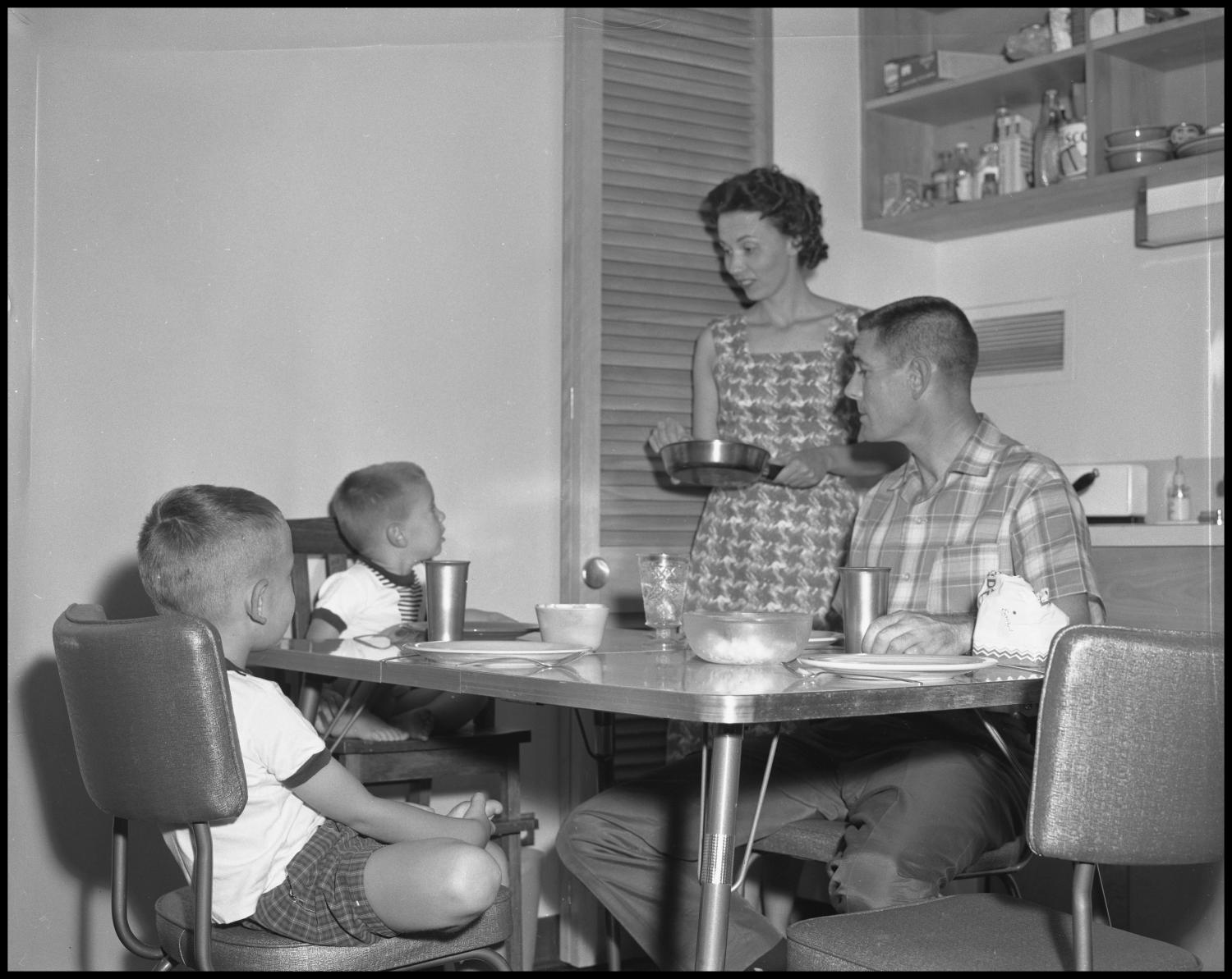 [Family Sharing a Meal] - The Portal to Texas History