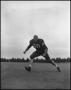 Photograph: [Football Player No. 60 Running on the Field, September 1962]