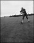 Photograph: [Football Player No. 84 Catching a Football, September 1962]