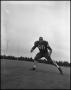 Photograph: [Football Player No. 60 in a Blocking Position, September 1962]