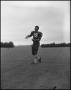 Photograph: [Football Player No. 15 in a Throwing Position, September 1962]