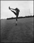 Photograph: [Football Player No. 87 in a Kicking Position, September 1962]