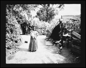 Primary view of object titled '[Woman with children]'.