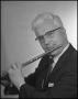 Photograph: [Dr. Morey Playing Flute]