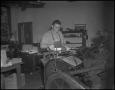 Photograph: [Man Working in Print Shop]