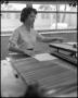 Thumbnail image of item number 1 in: '[Woman working in the print shop]'.