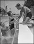 Thumbnail image of item number 1 in: '[Lifeguard with Two Students Swimming}'.