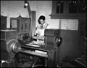 Primary view of object titled '[Student working in a wood working class]'.
