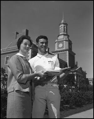 Primary view of object titled '[David Klement and Frances Braff in front of Administration Building]'.