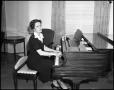Thumbnail image of item number 1 in: '[Woman playing the piano]'.