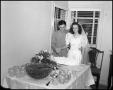 Thumbnail image of item number 1 in: '[Bride and Groom with Wedding Cake]'.