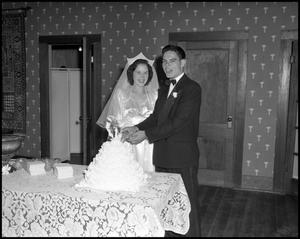 Primary view of object titled '[Couple with Wedding Cake]'.
