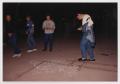 Thumbnail image of item number 1 in: '[Four Men Viewing a Chalk Outline of a Body]'.