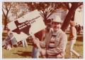 Photograph: [Don Baker holding a sign at the 1979 March on Washington]