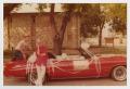 Primary view of [Two Men with a Red Convertible]