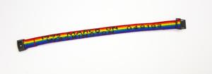 Rainbow striped wristband with the words March On Washington on it.