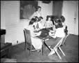 Photograph: [Women playing cards]