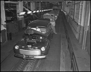 Primary view of object titled '[Automobiles on an assembly line, 2]'.