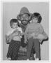 Photograph: [Ken Curtis with two children]