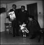 Photograph: [AFROTC members present a doll]