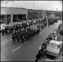 Photograph: [AFROTC members march in the Homcoming Parade November 5, 1966]
